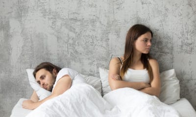 A Man and a Woman in a White Bed