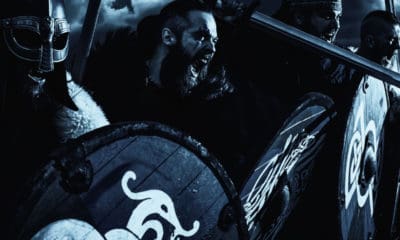 Vikings getting ready to battle, sword, shield, night, warrior